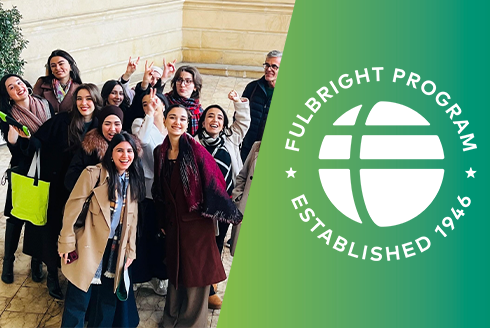 study abroad students in a group photo with the fulbright logo 