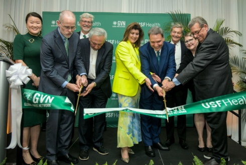 Leaders of USF and the Global Virus Network cutting the ceremonial ribbon for the new international headquarters