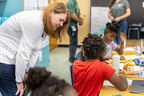 Jenifer Jasinski Schneider in a classroom