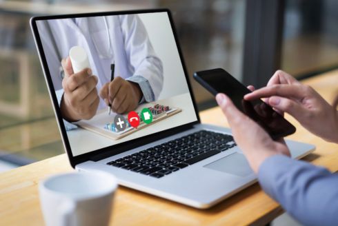 telehealth appointment on laptop