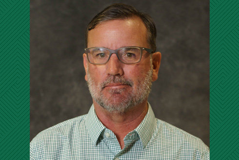 headshot of dean derek wildman