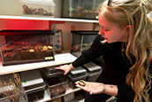 grad student holding millipede