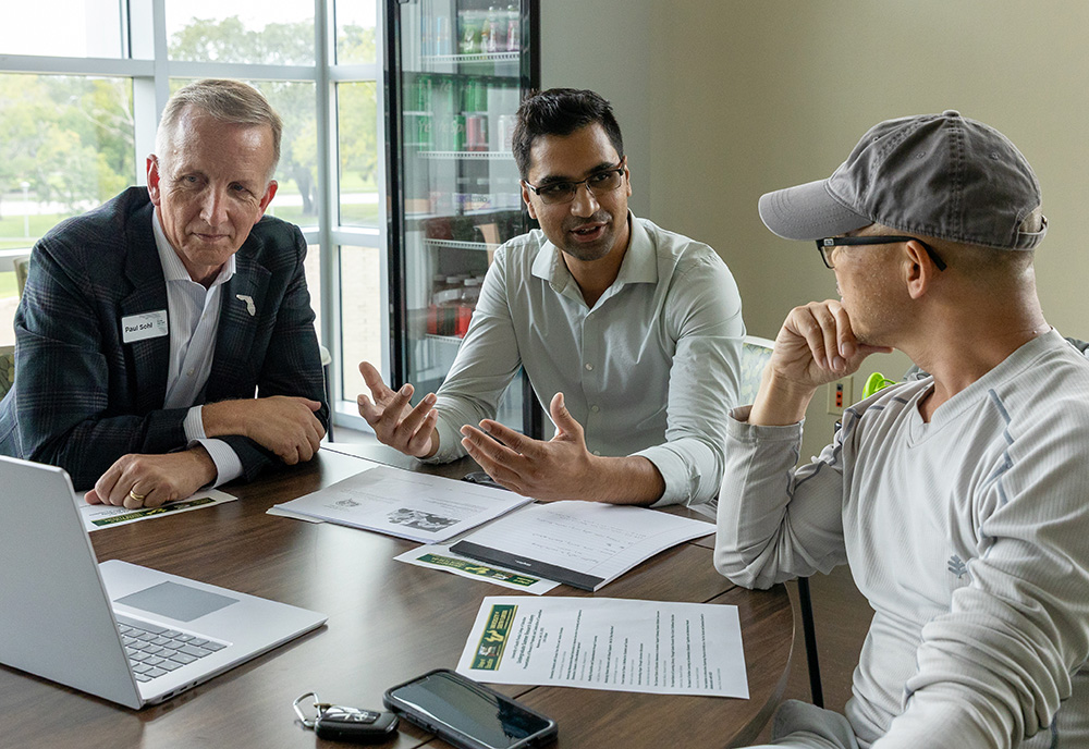Paul Sohl with undergraduate researcher and faculty member