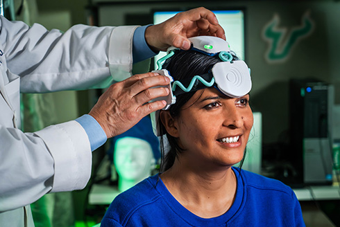 woman wearing TEMT-RF head cap