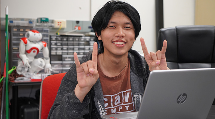 student at laptop