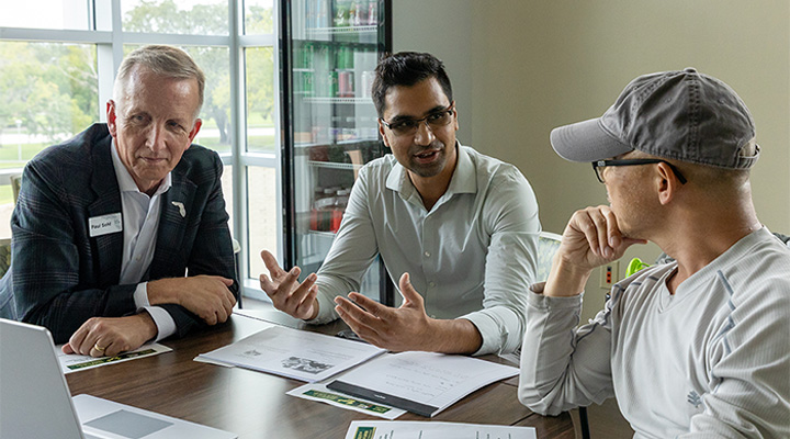 Paul Sohl with student and faculty member