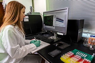 woman in lab coat