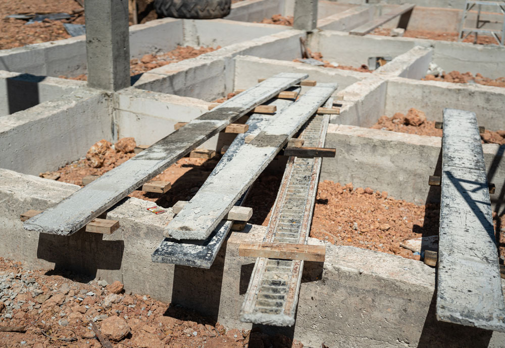 Building material composed of crumb rubber concrete