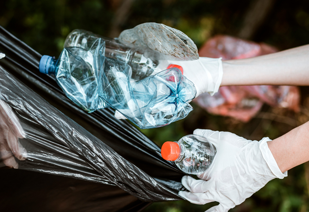 Trash turned into renewable energy by placing in bags from landfills