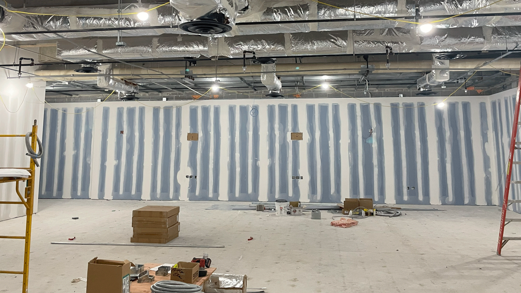 A picture of the interior of the lab, with drywall and HVAC visible