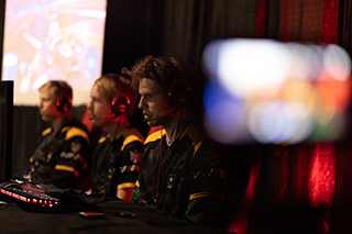 USF student participating in a video game competition during an esports event.