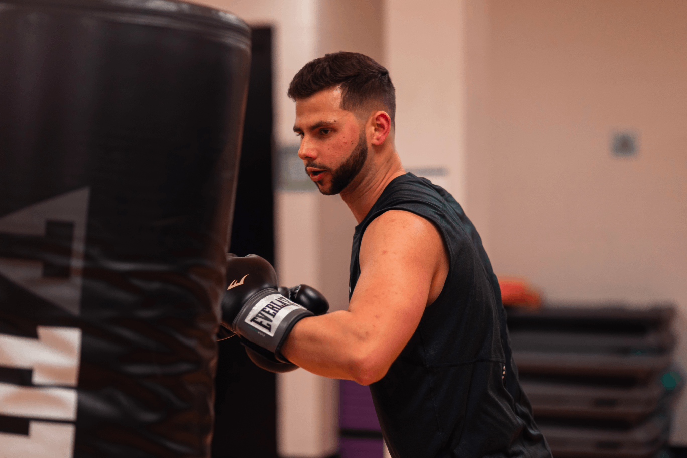Boxer punching a punching bag