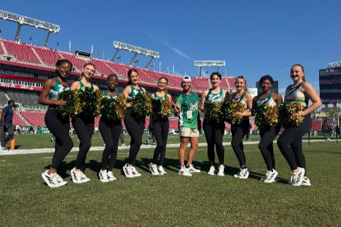 Cheer members on the field