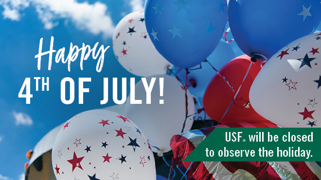 "Happy 4th of July - USF will be closed to observe the holiday." with red, white and blue balloons against a blue sky