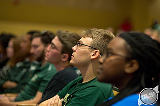 USF students listening at a lecture
