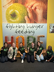 anna and students at second harvest office