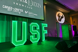 USF marquee letters on stage
