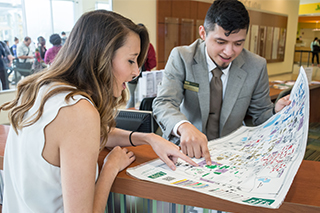 Two students looking at map