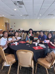 students at table with flags 2