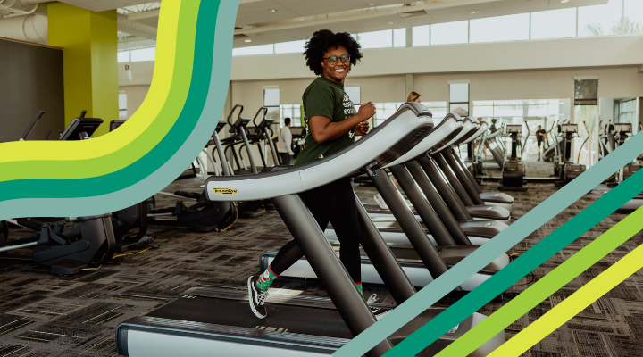 A person running on a treadmill inside the FIT