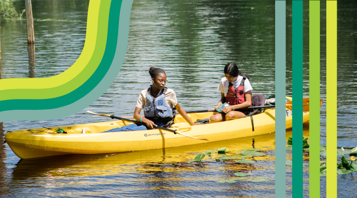 Two students paddling on the Hillsborough River