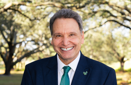 USF president Moez Limayem smiles for a headshot photo.