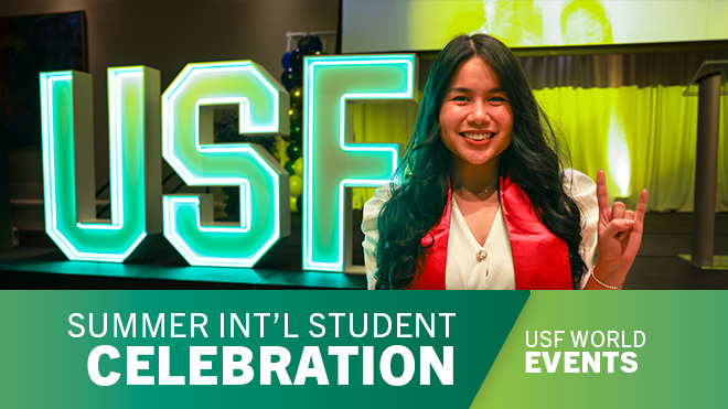 A smiling person holding up the "go bulls" sign in front of green neon letters "USF" with bottom banner that say "Summer int'l student celebration" and "USF World Events"