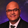 Headshot of Manish Moah, member of the USF World Advisory Council