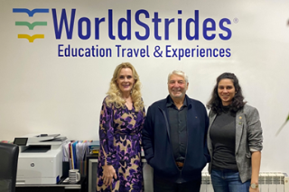 Dr. Kiki Caruson (left) and Vanessa Martinez (right) stand with a World Strides representative during a visit to France