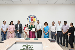BITS and USF representatives standing together at BITS