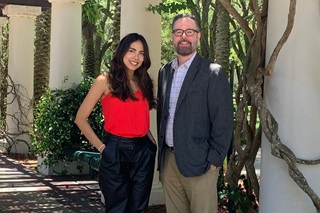 Dr. Maria Gonzalez and Mr. Rene Sanchez posing for a picture outside at USF in Tampa, FL