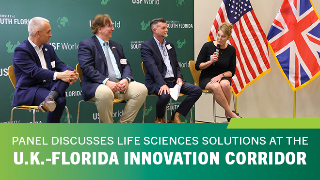 four people sitting in chairs in front of a USF World backdrop and the American and British Flag