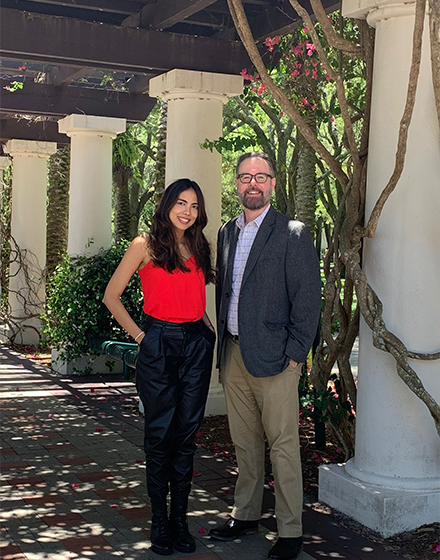 Dr. Maria Gonzalez and Mr. Rene Sanchez posing for a picture outside at USF in Tampa, FL
