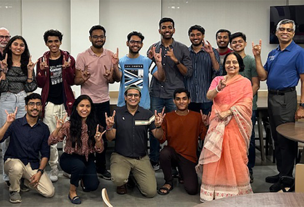 group of students with USF Professor Kaushik Dutta and Aruna Dasgutpa on far right