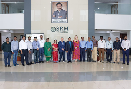 A group standing in the lobby of SRM University: Prof. Manoj K Arora, Vice Chancellor, SRM University-AP, Dr Prashant Mohapatra, Provost & Executive Vice President of the University of South Florida, along with Dr Kiki Caruson, Vice President, USF
