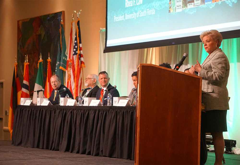 USF President Rhea Law, speaks with a panel of international business specialists at the International Business Forum held at USF