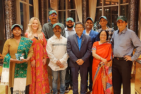 Alumni are wearing USF hats. In the picture left to right: Front row – Anita Thippaiah (far left), Venkateswara Rao Mudunuru, Provost Prasant Mohapatra, Aruna Dasgupta, Karan Manocha (far right). Back row – Kiki Caruson, Sampath Kalluri, Nitish Setipalli, Lajpat Roy, S.V. Sudhirkashyap