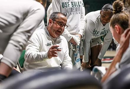 Coach Fernandez addresses his basketball team