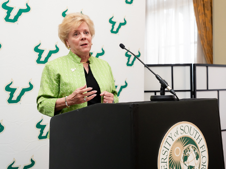 USF President Law speaks at podium