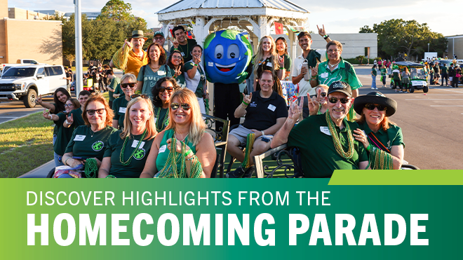Group of people with a world mascot smiling on a trailer decorated for a parade with a lower-thirds green bar and text that reads "Discover Highlights from the Homecoming Parade"