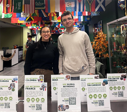 Kyle and Cailtin at the USF Global Networks booth