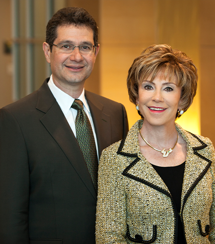 Two people smiling