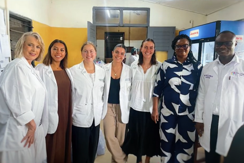 Group of people wearing doctor coats