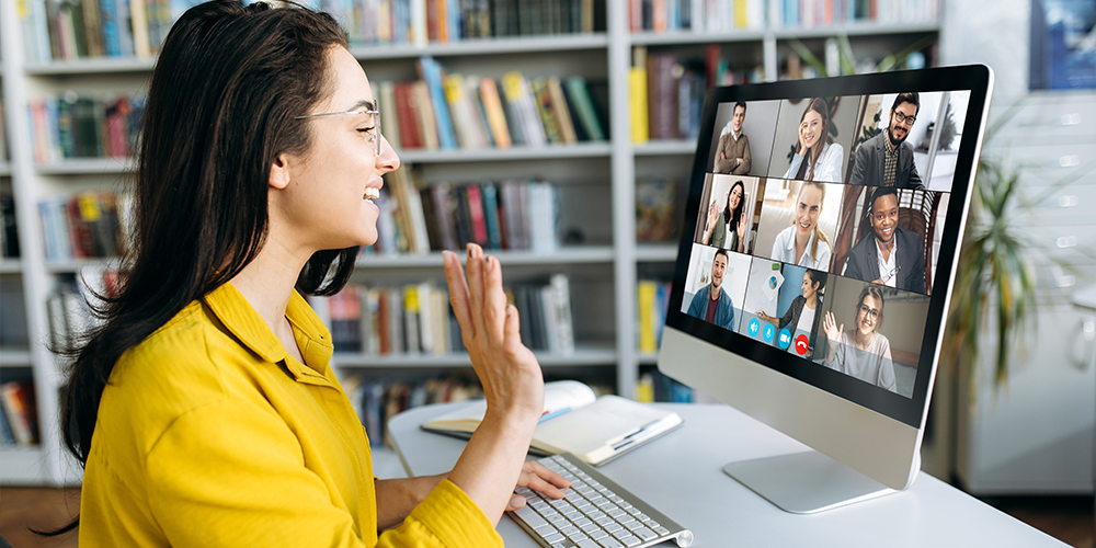 Person smiling and waving