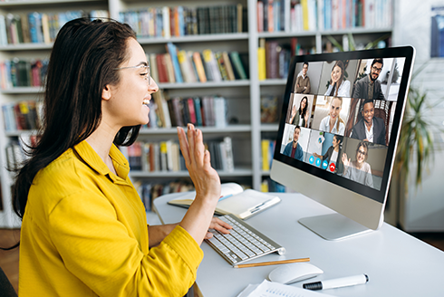 Person smiling and waving