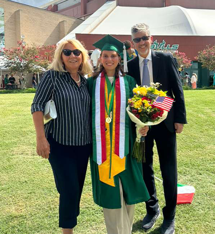 Vittoria and her parents at graduation